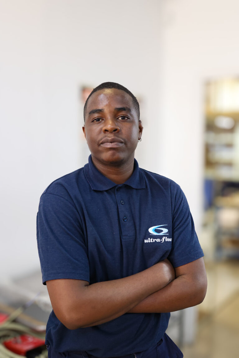 Ultra-Flow team member — on the production floor
