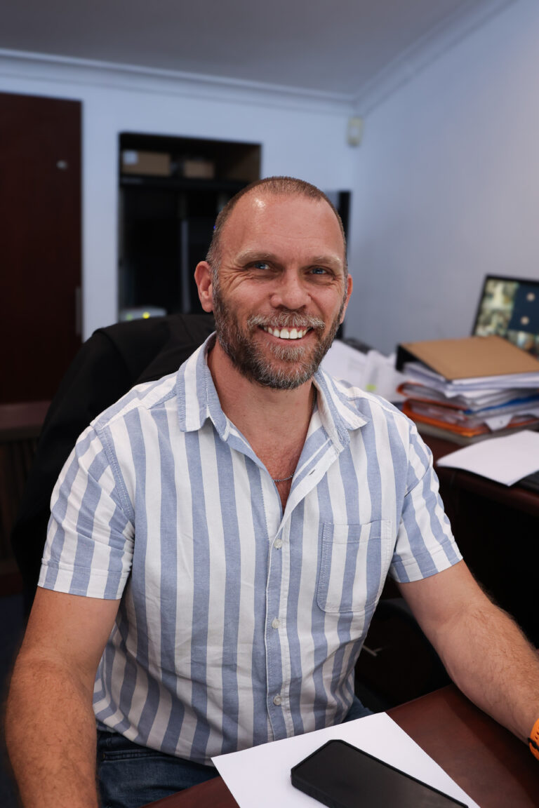 Ultra-Flow team member — in the office