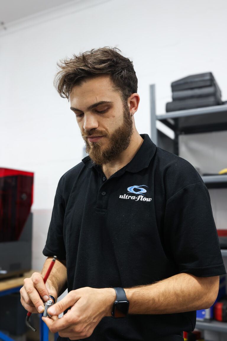 Ultra-Flow team member — eyes on the job