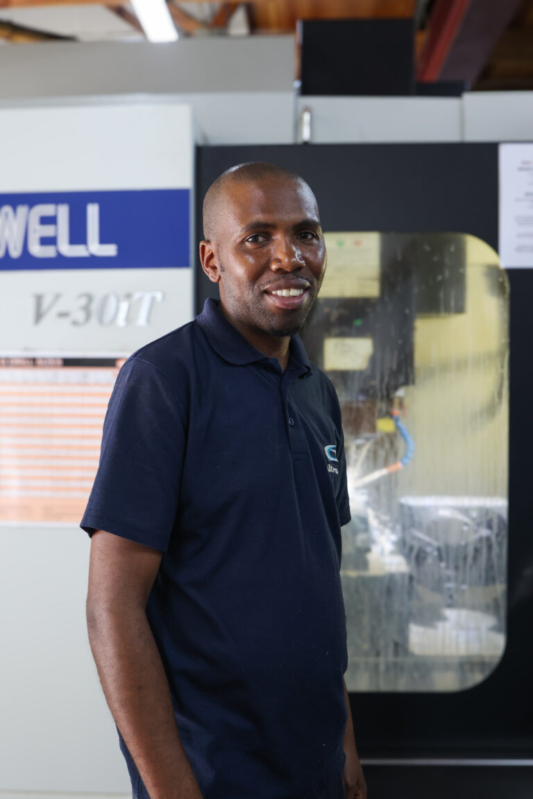 Ultra-Flow team member — on the production floor