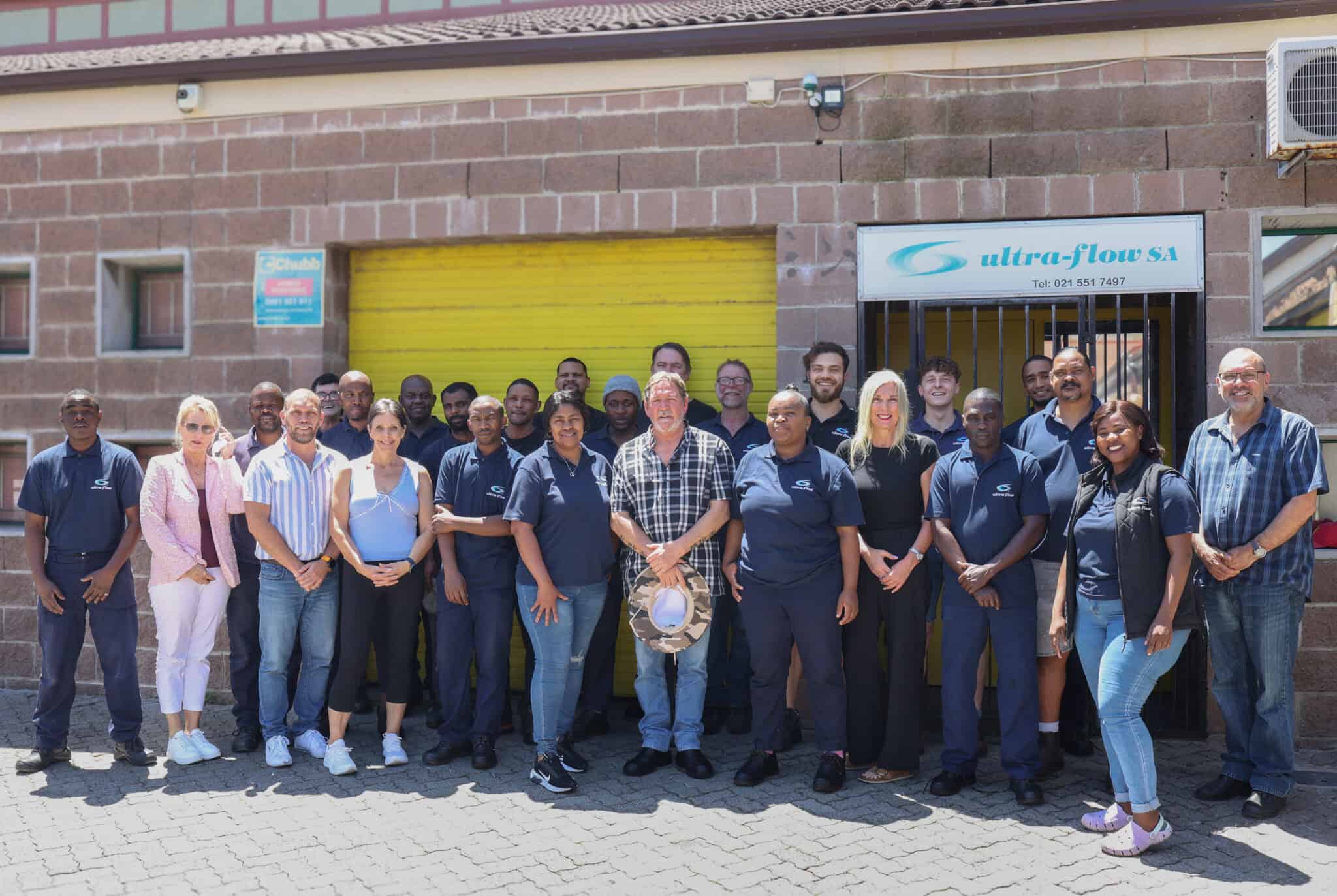 The Ultra-Flow team together outside the Montague Gardens workshop in Cape Town