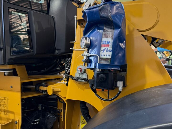Ultra-Flow grease pump installed on a wheel loader