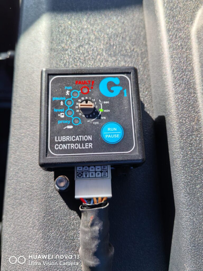Close up of an Ultra-Flow lubrication controller keypad and display