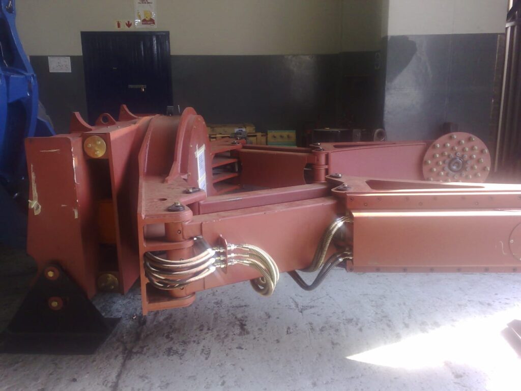 Lubrication lines installed on red industrial plant equipment